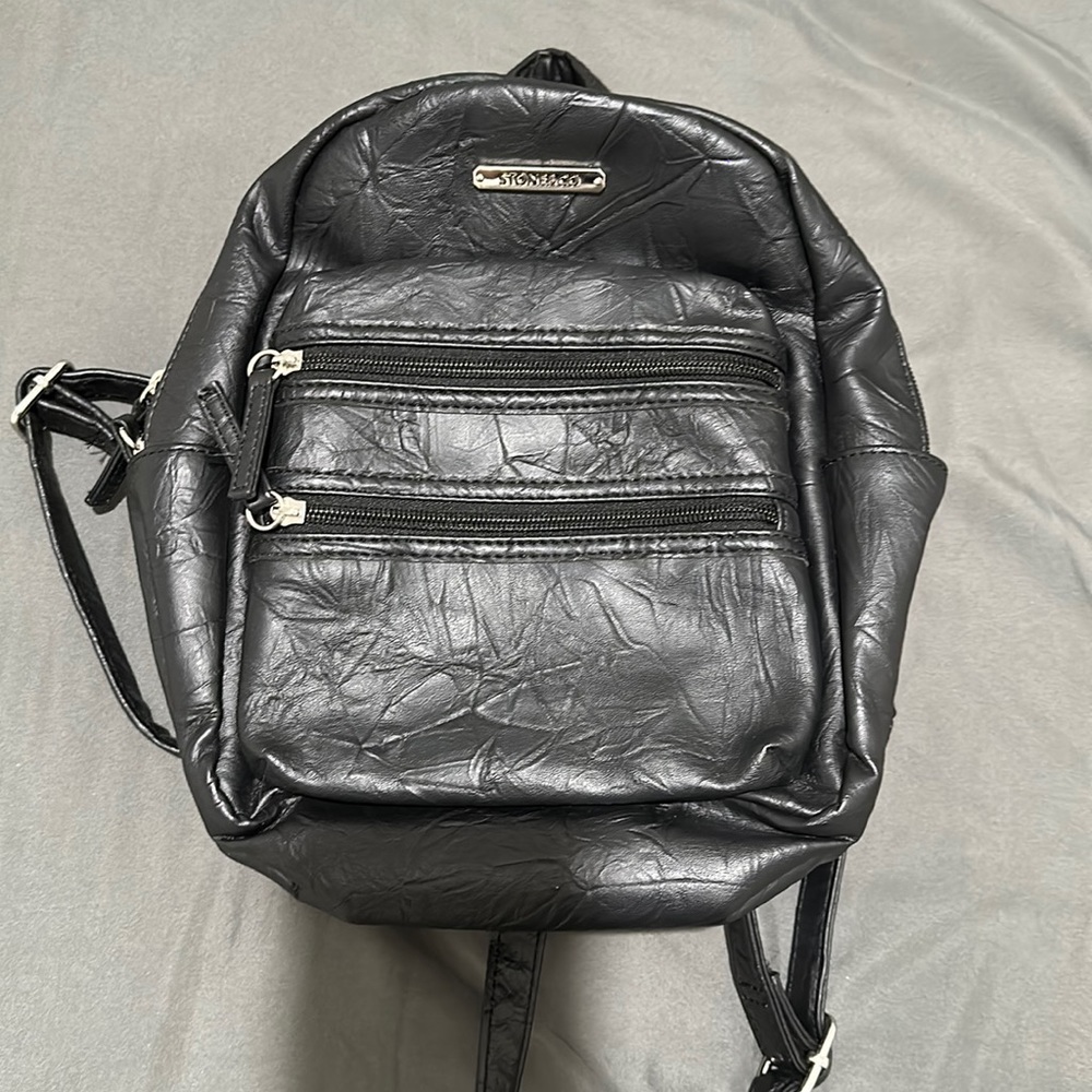 Small back bag women black used but like new